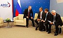 С членами российской делегации перед началом встречи с Премьер-министром Канады Стивеном Харпером.