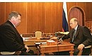 President Vladimir Putin meeting with Prosecutor-General Vladimir Ustinov.
