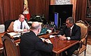 С Министром обороны Сергеем Шойгу и Министром финансов Антоном Силуановым.