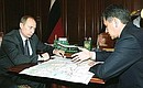 President Putin with Sergei Shoigu, Minister for Civil Defence, Emergency Situations and Disaster Relief.