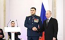 Presentation of Gold Star medals to Heroes of Russia. With Lieutenant Colonel Sultan Khashegulgov. Photo: Valery Sharifulin, TASS