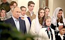Vladimir Putin attends a Christmas service at the Church of the Icon of Saviour Not Made by Hands in Novo-Ogaryovo together with the families of service personnel who died in the special military operation zone.