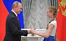 Владимир Путин вручил паспорта юным гражданам России.