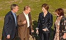 Vladimir and Lyudmila Putin with U.S. President George W. Bush and Laura Bush.