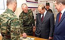 President Putin with servicemen of the 201st Motorised Rifle Division. Right — Russia\'s Defence Minister Sergei Ivanov.