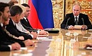 Vladimir Putin announces the signing of the 2013–2015 Budget Address at a meeting with members of the Government and the Federal Assembly leadership.