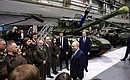 With employees of the Uralvagonzavod Research and Production Corporation.