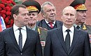 On the Day of Memory and Grief, Vladimir Putin laid a wreath at the Tomb of the Unknown Soldier by the Kremlin wall. With Prime Minister Dmitry Medvedev.
