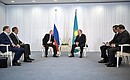 At a meeting with President of Kazakhstan Nursultan Nazarbayev.