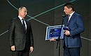 At the Russian Geographical Society awards ceremony. With Igor Spiridenko, winner in the category Best Expedition in Russia and project director of Tyurikov’s Aircraft. Return.