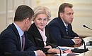 Before the meeting with Government members. From left: Deputy Prime Ministers Dmitry Kozak and Olga Golodets and First Deputy Prime Minister Igor Shuvalov.