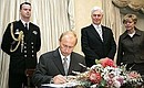 Vladimir Putin signed the book for honoured guests of Australia\'s Governor General Michael Jeffrey residence.