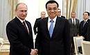 With Premier of the State Council of the People’s Republic of China Li Keqiang.