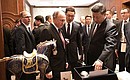 During the talks, President Xi Jinping presented Vladimir Putin with a silverware set from the Beijing Friendship Hotel and a ceramic figurine Legendary Horse on the Silk Road, a copy of the original piece at the National Museum of China in Beijing.
