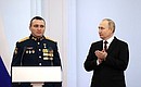 At the ceremony to present Gold Star medals to Heroes of Russia. With Lieutenant Colonel Alexander Zavadsky, Commander of the 7th Separate Guards Motor Rifle Regiment of the 11th Army Corps of the Baltic Fleet of the Western Military District. Photo: Sergei Karpukhin, TASS