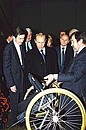 Vladimir Putin at the Centre for the Production of Prosthetic and Orthopaedic Equipment at the experimental engineering plant of the Energia Rocket and Space Corporation (RSC Energia). An exhibition of Russian-made equipment for the disabled.
