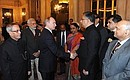 С Президентом Индии Пранабом Мукерджи во время церемонии представления членов делегаций.