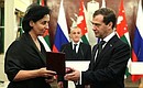 Dmitry Medvedev presented The Order of Courage to Marina Shonia, widow of Abkhazian President in 2005–2011 Sergei Bagapsh.