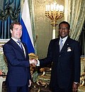 With President of the Republic of Equatorial Guinea Teodoro Obiang Nguema Mbasogo.