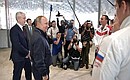 Vladimir Putin talks with young athletes during a visit to Water Sports Palace at Luzhniki Olympic Complex.