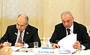 Deputy Chief of Staff of the Presidential Executive Office Magomedsalam Magomedov (right) and Deputy Speaker of the Federation Council Ilyas Umakhanov at the meeting of the Council for Interethnic Relations.