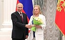 The Order of Friendship is presented to singer Larisa Dolina.