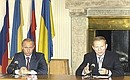 President Putin at a joint press conference with Ukrainian President Leonid Kuchma.