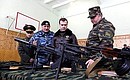 Reviewing military equipment at the Zubr special purpose police unit base.