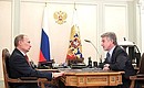 С председателем правления газовой компании «НОВАТЭК» Леонидом Михельсоном.