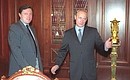 Vladimir Putin with Grigory Yavlinsky, the leader of the Yabloko parliamentary party.