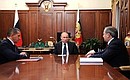 С вице-премьером – полпредом Президента в Дальневосточном федеральном округе Юрием Трутневым (слева) и главой МЧС Владимиром Пучковым.