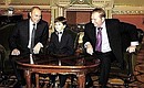 With Ukrainian President Leonid Kuchma and first-year pupil of the school number 125 of Kiev Andrey Sen\'ko.