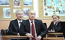 With Moscow Mayor Sergei Sobyanin (left) and Deputy Prime Minister Olga Golodets (right) during a history lesson at Moscow Gymnasium No. 1519.