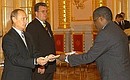 President Putin receiving the credentials of Ambassador of Burundi Emmanuel Tungamwese.