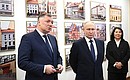 Vladimir Putin viewed a video presentation on the construction of a cultural and educational complex in Kaliningrad. Photo: Grigoriy Sisoev, RIA Novosti