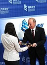 At the Far East Federal University. Vladimir Putin presents the symbolic key to the new campus to the Far East Federal University.