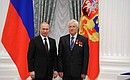 Presenting Russian Federation state decorations. The Order for Services to the Fatherland, IV degree, is awarded to borer operator at the All-Russian Research Institute of Experimental Physics (RFNC — VNIIEF) Federal State Unitary Enterprise Yury Karev.
