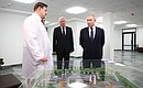 During a visit to the cancer centre in the Kaliningrad Region. With acting Chief Medical Officer Kirill Barinov (left) and Presidential Plenipotentiary Envoy to the Northwestern Federal District Alexander Gutsan.