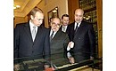 From right to left, President Putin with Minister of Foreign Affairs Igor Ivanov, Security Council Secretary Sergei Ivanov, and Pyotr Stegny, Director of the Ministry of Foreign Affairs Historical Documents Department, taking a look at Ministry of Foreign Affairs archive documents.