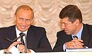 President Putin with First Deputy Chief of Staff of the Presidential Executive Office Dmitry Kozak at a meeting of the Congress of Municipal Communities.