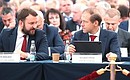 Plenary meeting of the RSPP Congress. Presidential Aide Maxim Oreshkin (left) and Minister of Industry and Trade Denis Manturov.