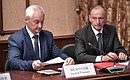 Presidential Aide Andrei Belousov (left) and Secretary of the Security Council Nikolai Patrushev before the meeting of Military-Industrial Commission.