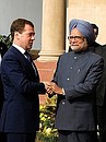 С Премьер-министром Индии Манмоханом Сингхом.