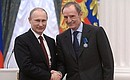 Presenting Russian Federation state decorations. Chairman of the International Olympic Committee Coordination Commission Jean-Claude Killy is awarded the Order of Honour.