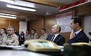 Vladimir Putin and Bashar al-Assad heard a report by the Commander of the Russian group of forces in Syria on the operation to liberate the country from terrorists.