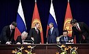Signing of documents following Russian-Kyrgyzstani talks.