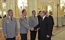 With Director of the Federal National Guard Service and Commander-in-Chief of the National Guard Viktor Zolotov at the ceremony to present senior officers and prosecutors appointed to higher positions.
