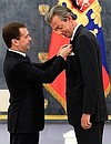 Presenting Russian state decorations to foreign citizens. President and CEO of Japan Tobacco International Pierre de Labouchere (France) receives the Order of Friendship.
