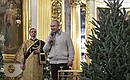On Christmas Eve the President attended a service at the Transfiguration Cathedral in St Petersburg. After the service Vladimir Putin addressed the believers: “I wish you all a merry Christmas and a happy New Year. May you be happy and in good health! Happy holiday, and thank you very much.”