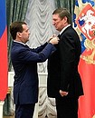 State decorations presentation ceremony. Vladimir Nekrasov, first vice-president of LUKOIL oil company, receives the Order for Services to the Fatherland IV degree.